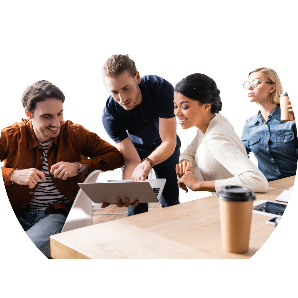 young-businessman-pointing-at-laptop-near-multieth